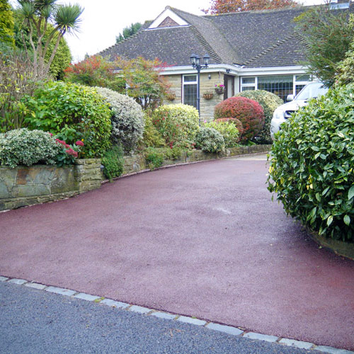 Photo of new tarmac drive with red pigment added